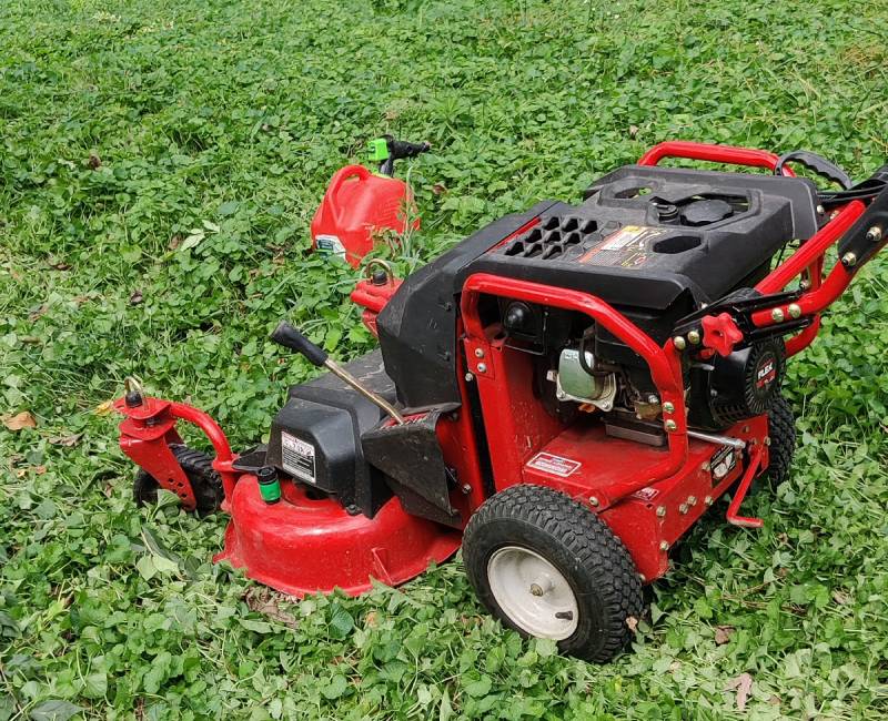 Lawnmower mowing a yard in Kansas City